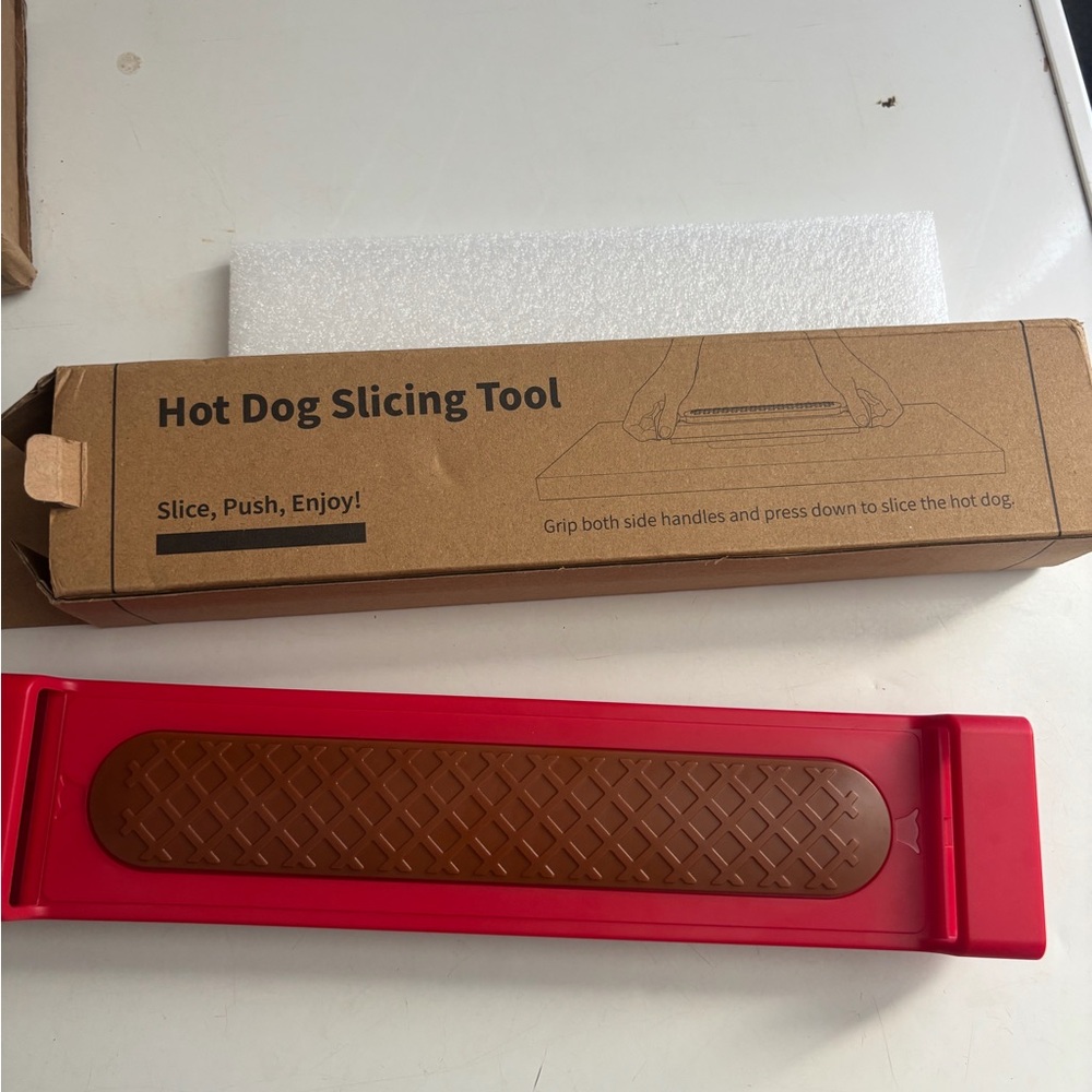 Red and Brown Hot Dog Slicing Tool